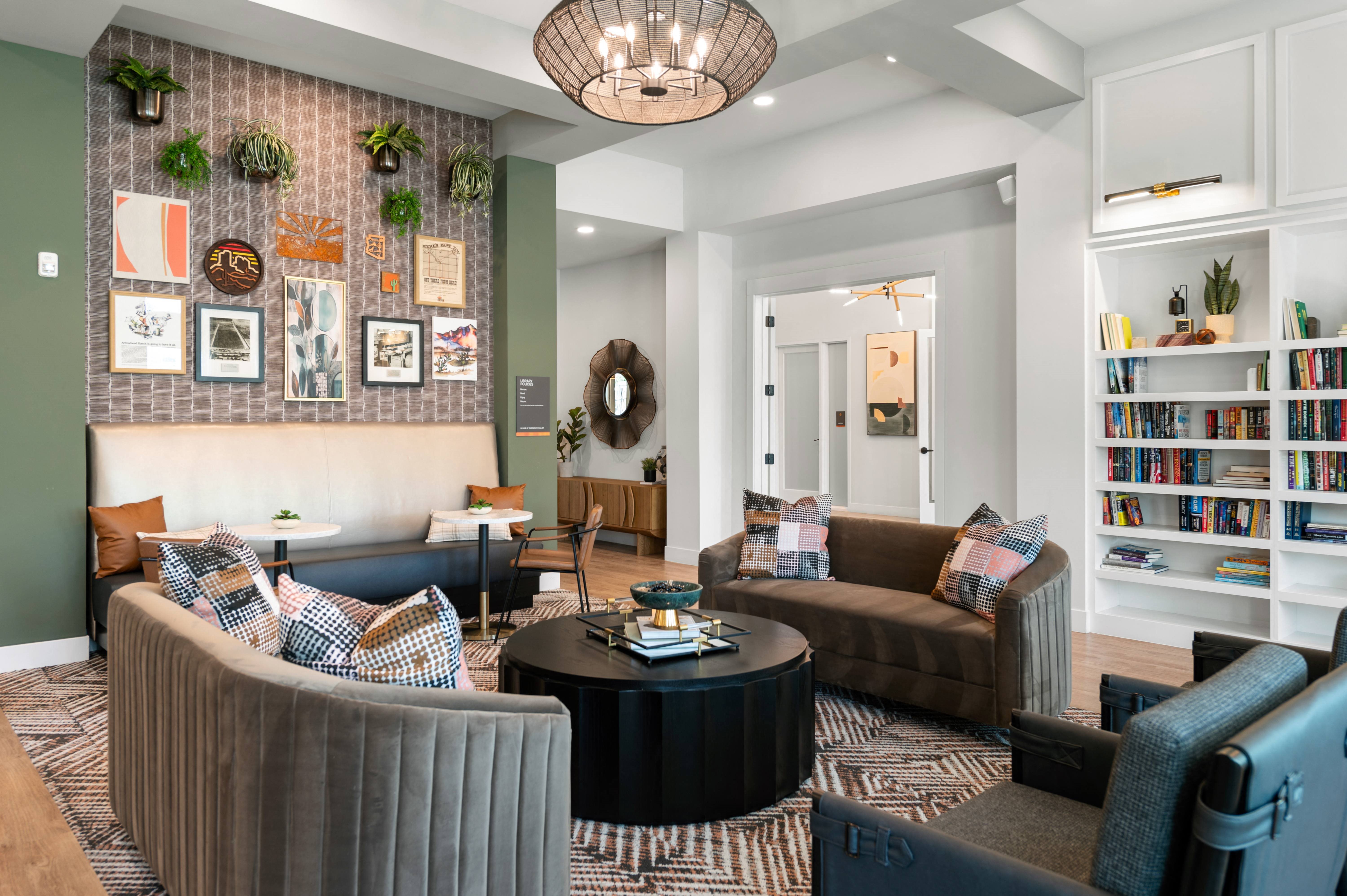 clubhouse with couches and chairs and a table